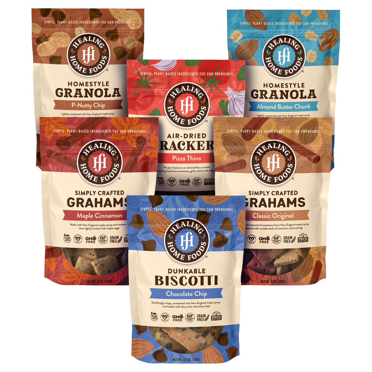 Assorted packages of Healing Home Foods granola and baked goods on a white background