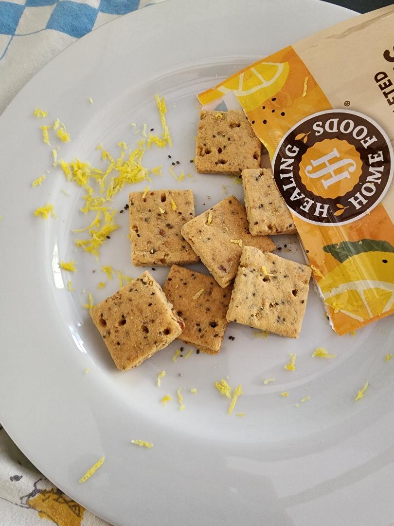 Crackers on a plate with a visible brand label